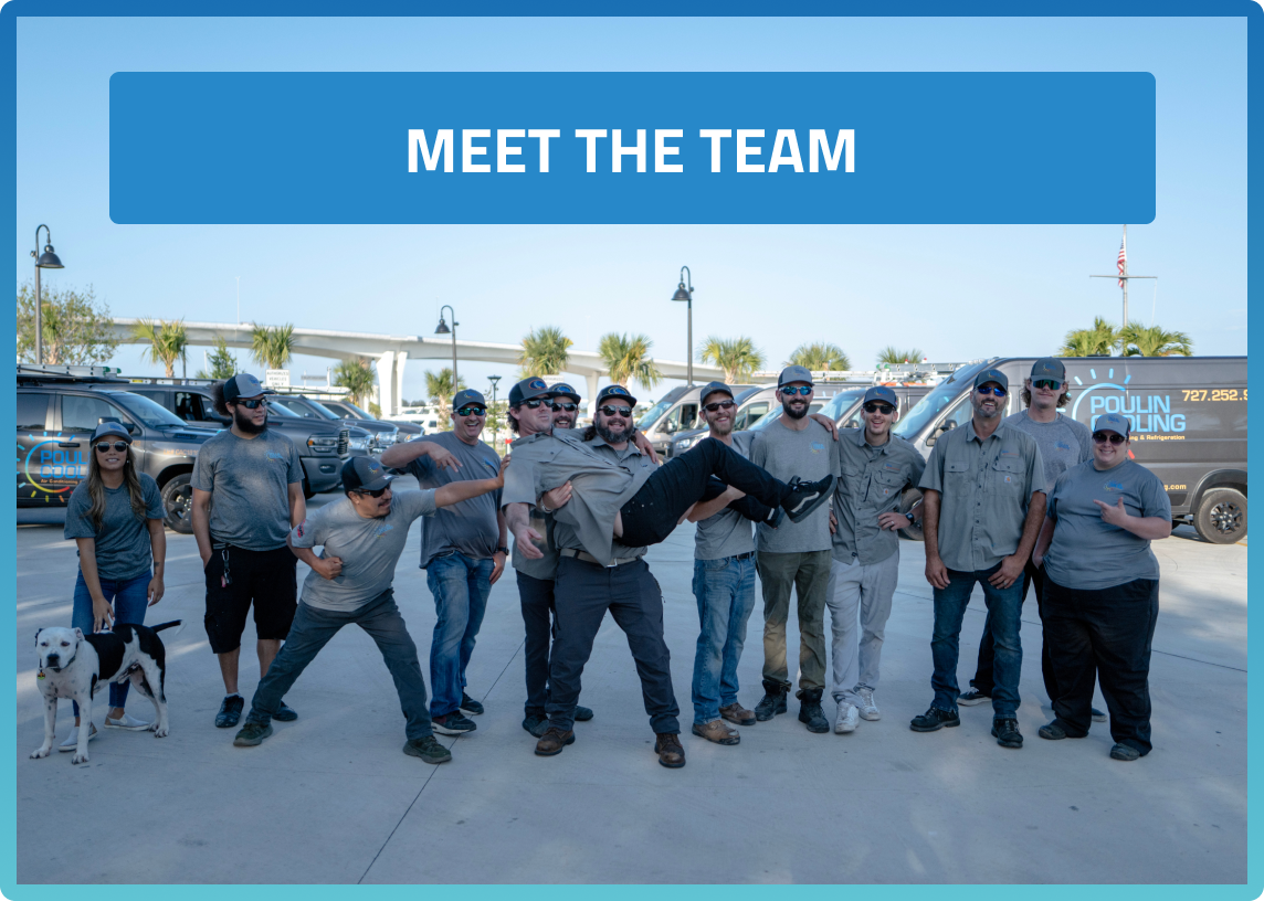 Poulin's company team joyfully posing together