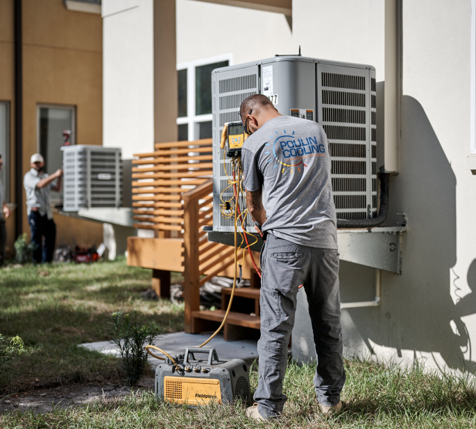 employees unloading AC units